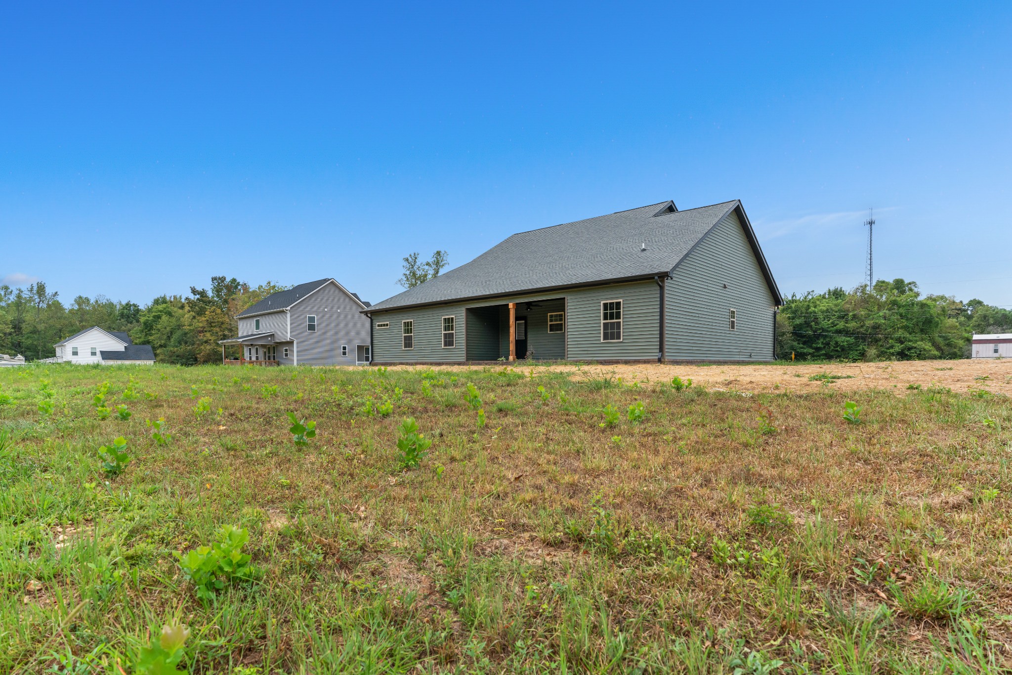 2615 Cooper Creek Road Woodlawn, TN 37191 - Photo 6 of 30 a front view of house with yard
