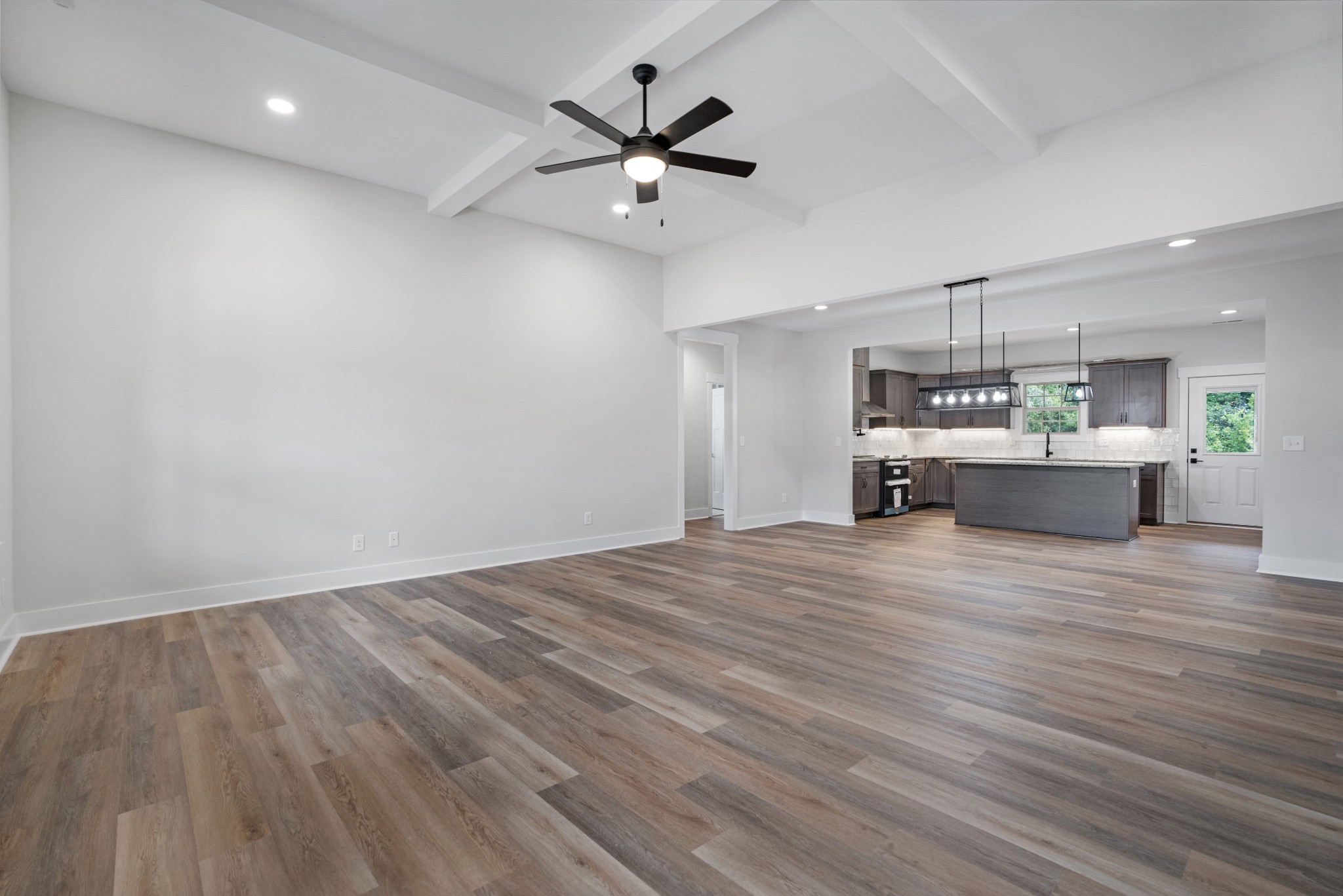 2615 Cooper Creek Road Woodlawn, TN 37191 - Photo 7 of 30 a view of kitchen and hall with wooden floor