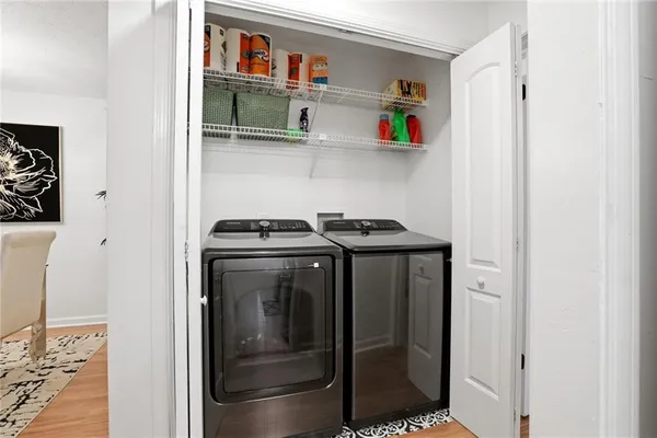 a utility room with washer and dryer