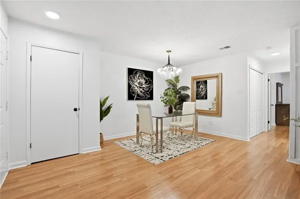 a view of a dining room with furniture