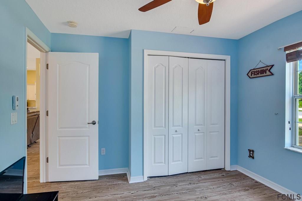 102 Ulysses Trail Palm Coast, FL 32164 - Photo 44 of 62 a view of an entryway with wooden floor