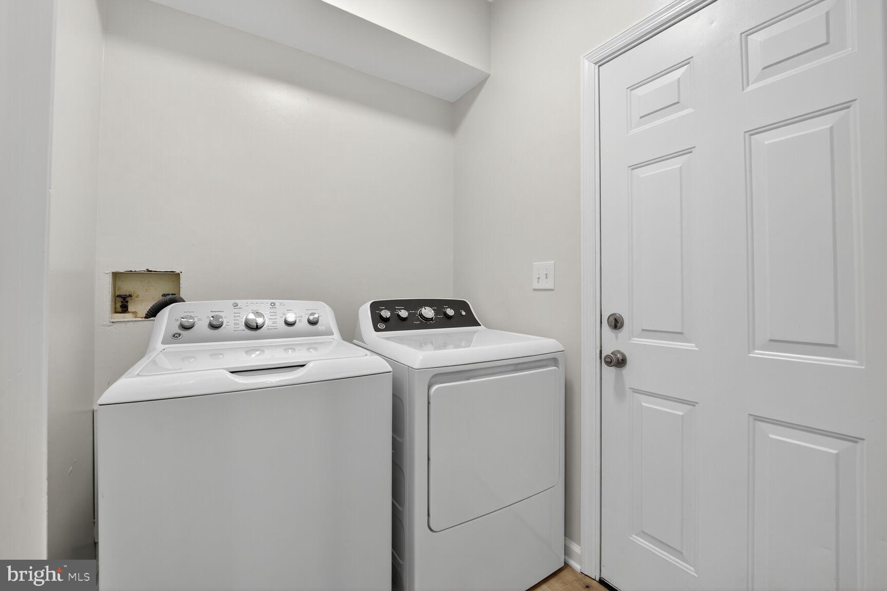 1992 Retta Gilliam Court Southeast Washington, DC 20020 - Photo 11 of 29 a utility room with dryer and washer
