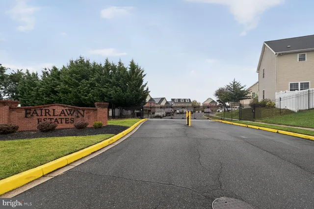 a view of swimming pool with a yard and sitting area