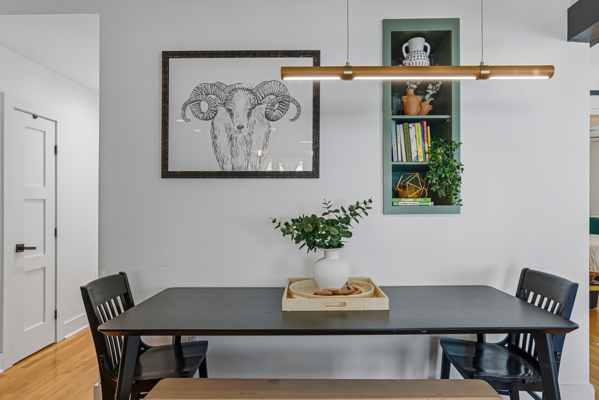 5409 Avenue H Austin, TX 78751 - Photo 12 of 35 a view of a dining room with furniture and a potted plant