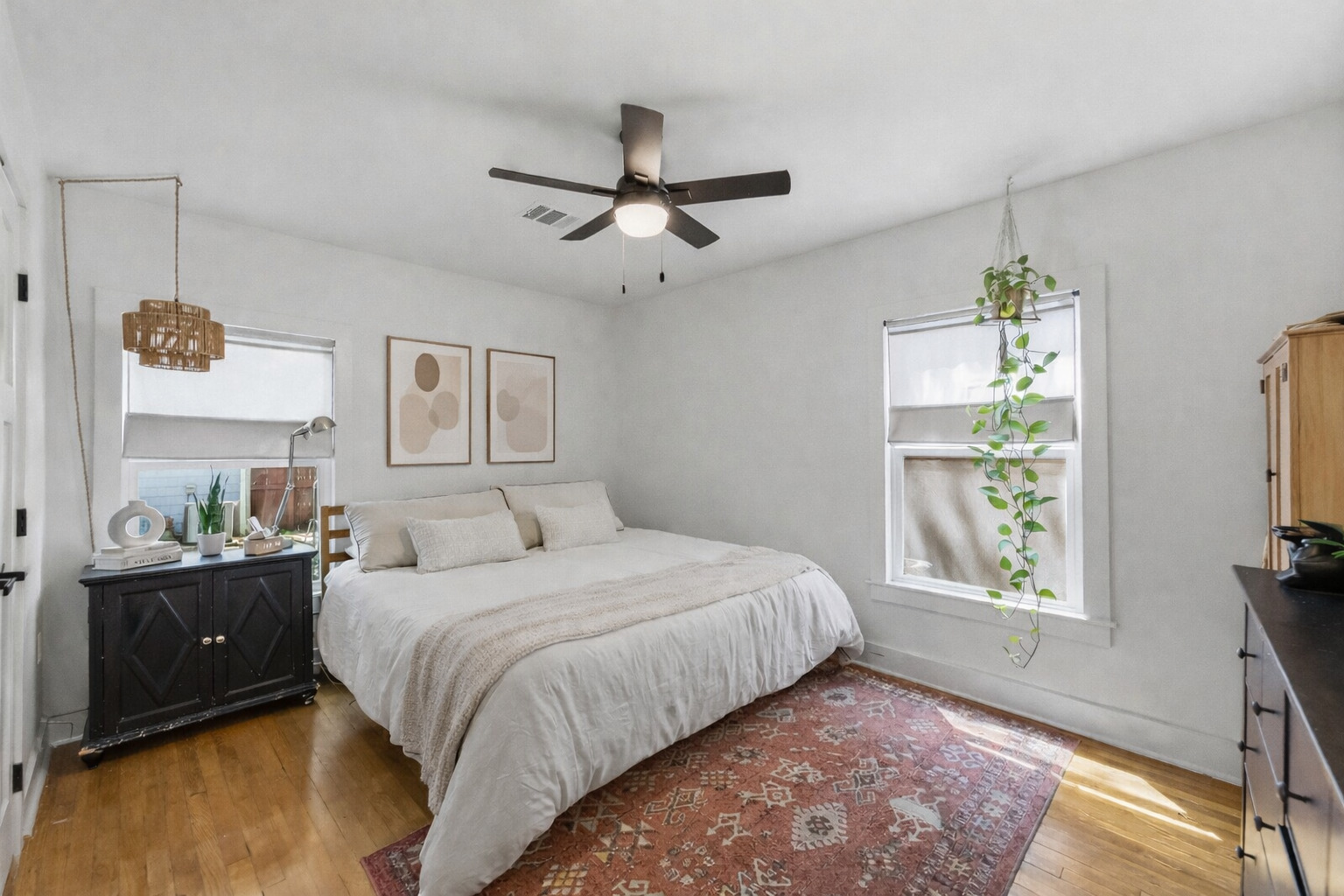 5409 Avenue H Austin, TX 78751 - Photo 16 of 35 a bedroom with a bed and a window