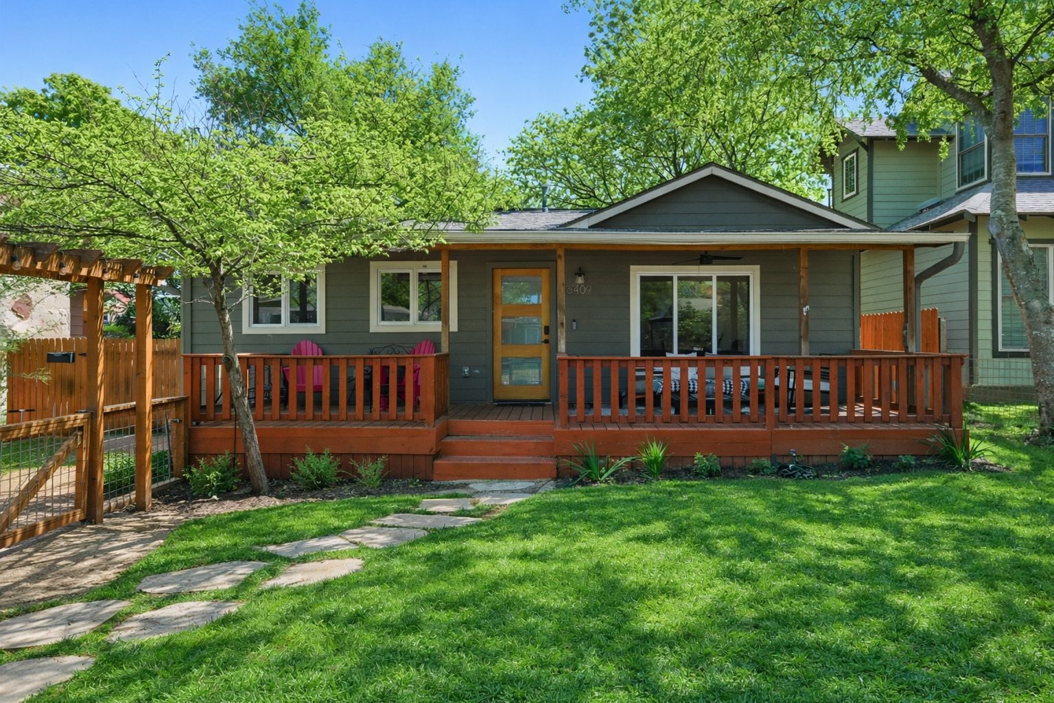 5409 Avenue H Austin, TX 78751 - Photo 2 of 35 a view of a house with a yard and deck
