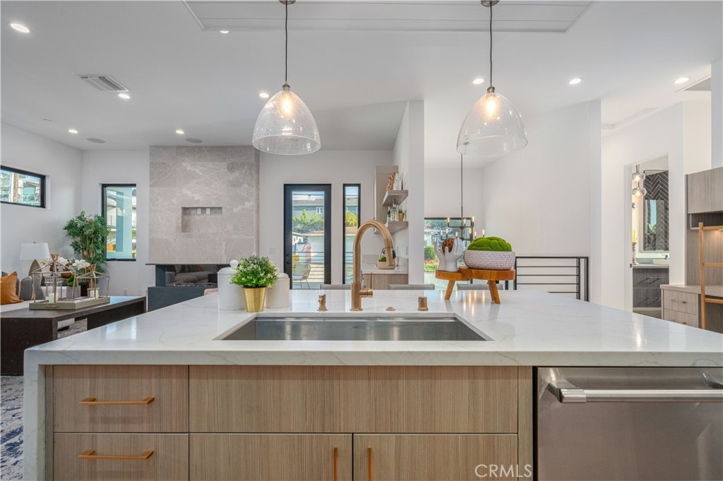 2101 Rockefeller Lane Redondo Beach, CA 90278 - Photo 14 of 45 a kitchen with sink and a large mirror
