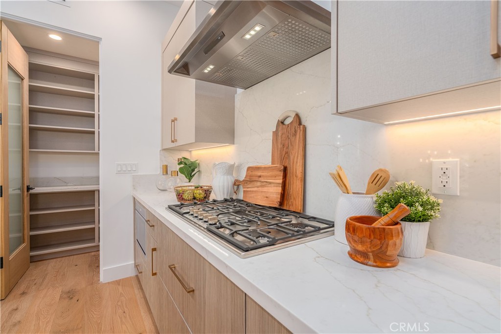 2101 Rockefeller Lane Redondo Beach, CA 90278 - Photo 16 of 45 a kitchen with a stove and a refrigerator