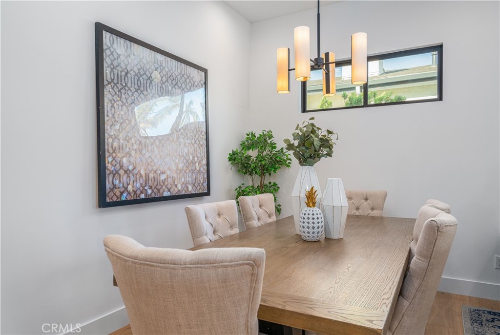 2101 Rockefeller Lane Redondo Beach, CA 90278 - Photo 19 of 45 a living room with furniture and a potted plant