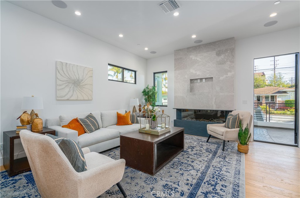 2101 Rockefeller Lane Redondo Beach, CA 90278 - Photo 2 of 45 a living room with furniture and wooden floor