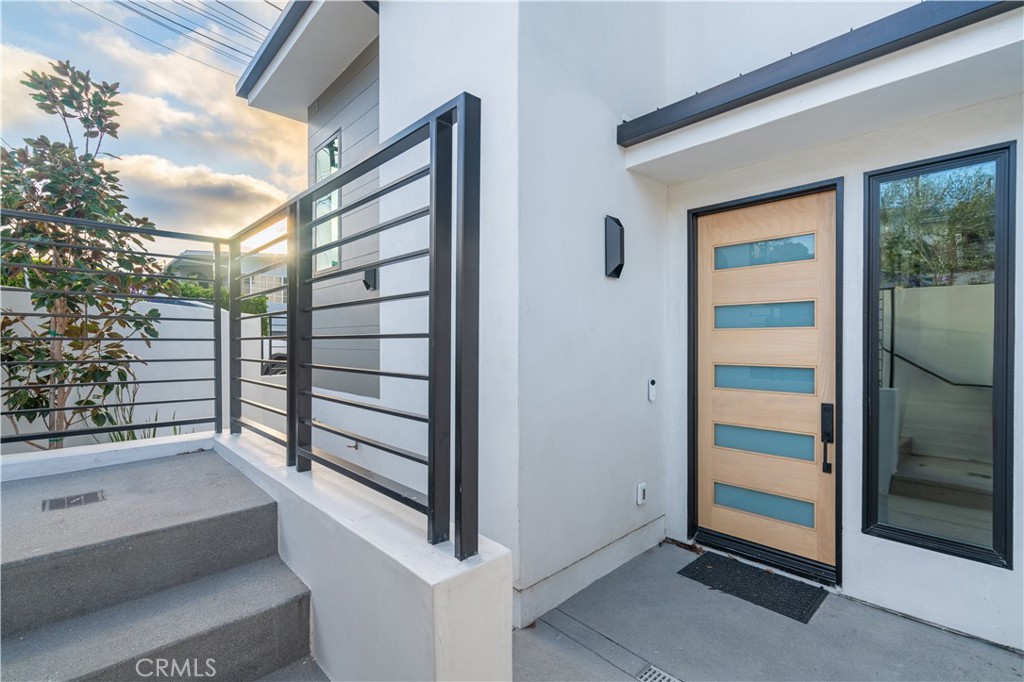 2101 Rockefeller Lane Redondo Beach, CA 90278 - Photo 45 of 45 a view of a room that has a large window and wooden floor