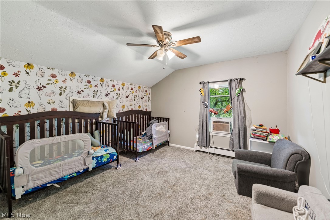 6711 Norwalk Road Medina, OH 44256 - Photo 18 of 46 Bedroom with ceiling fan / light and carpet flooring