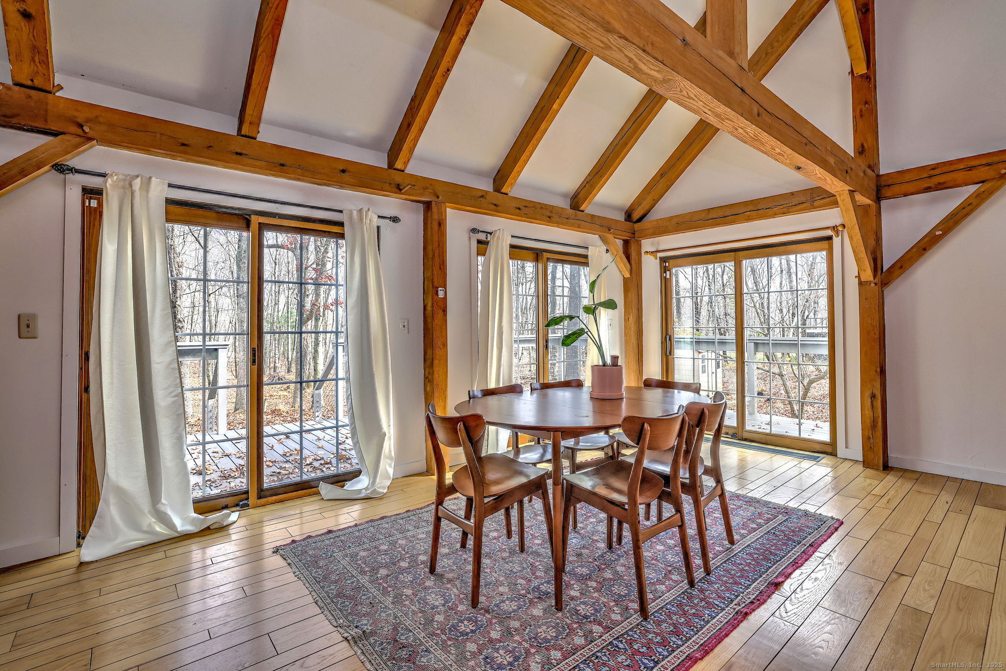 24 Hickory Lane Roxbury, CT 06783 - Photo 14 of 40 a dining room with furniture window wooden floor