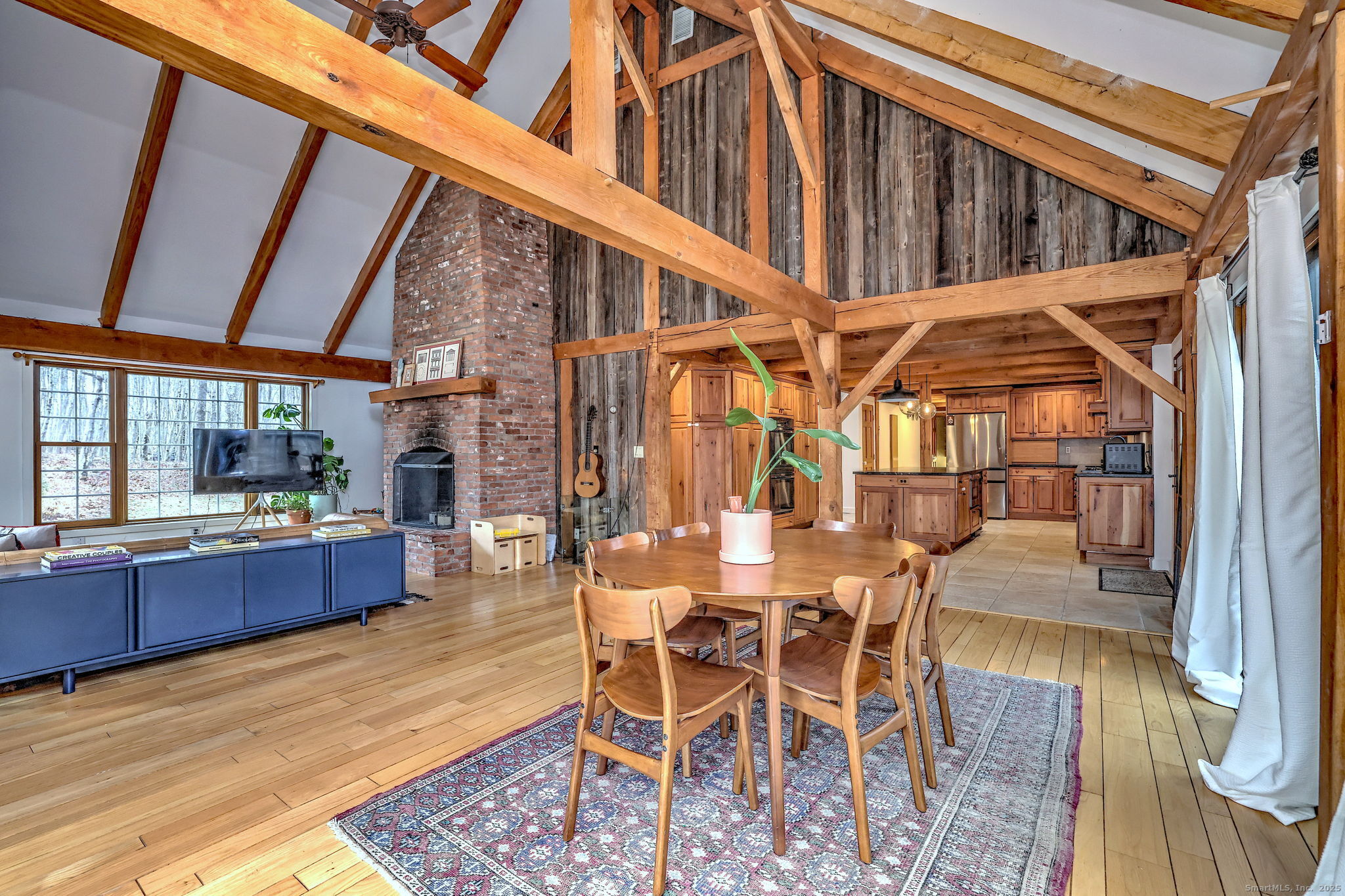 24 Hickory Lane Roxbury, CT 06783 - Photo 16 of 40 a view of a dining room with furniture and window