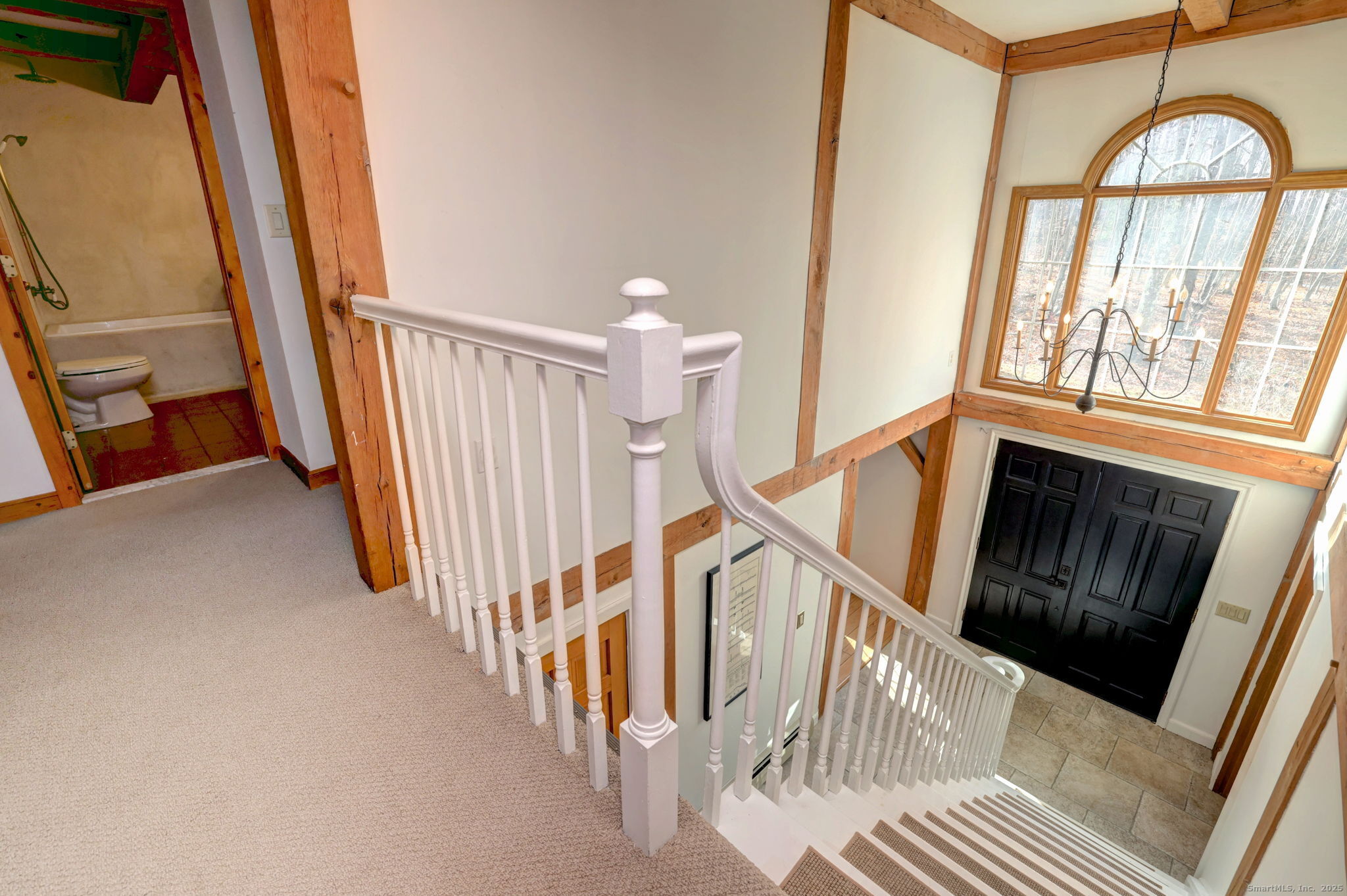 24 Hickory Lane Roxbury, CT 06783 - Photo 21 of 40 a view of an entryway with wooden floor
