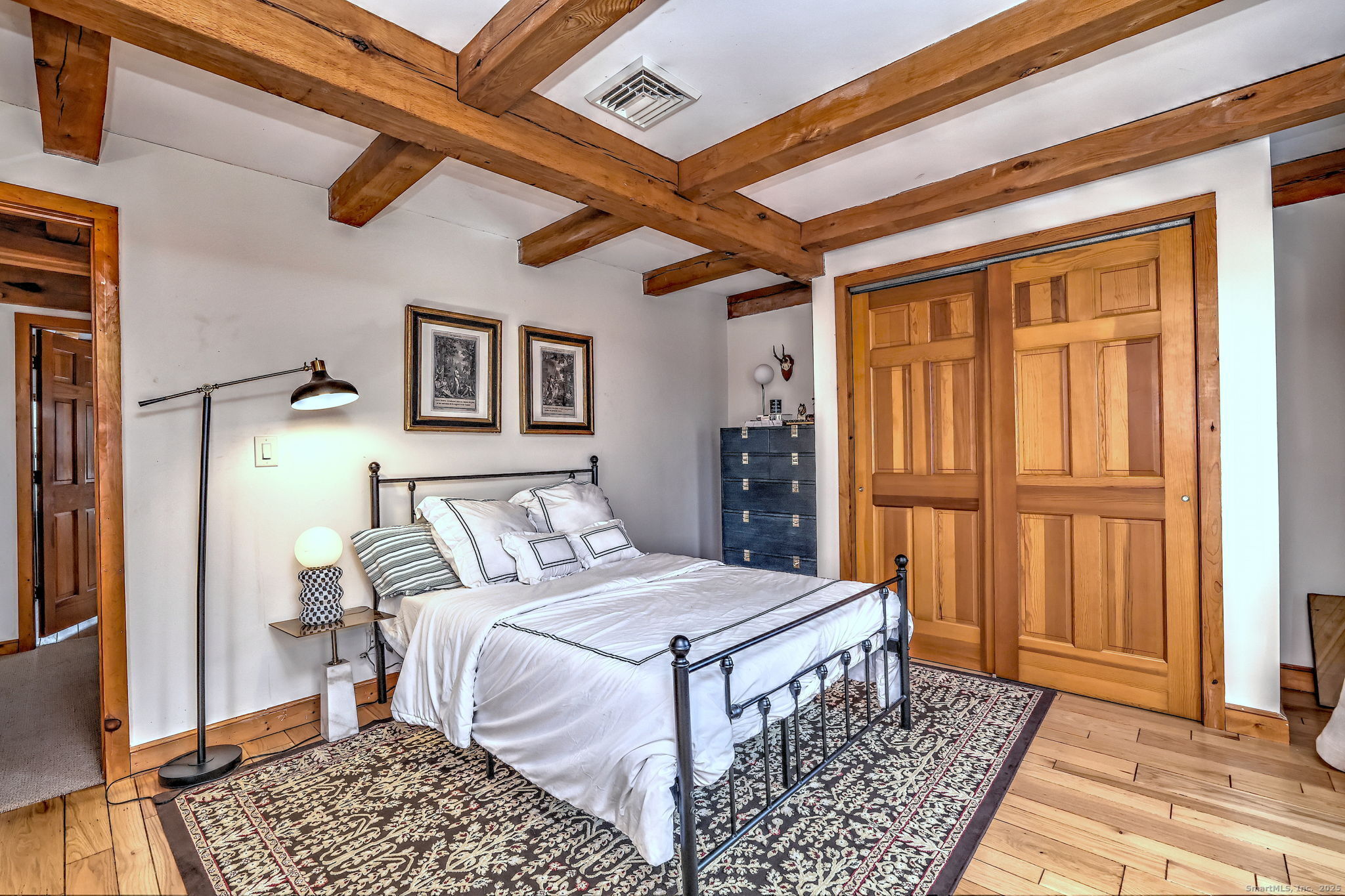 24 Hickory Lane Roxbury, CT 06783 - Photo 27 of 40 a bed room with a bed and a window