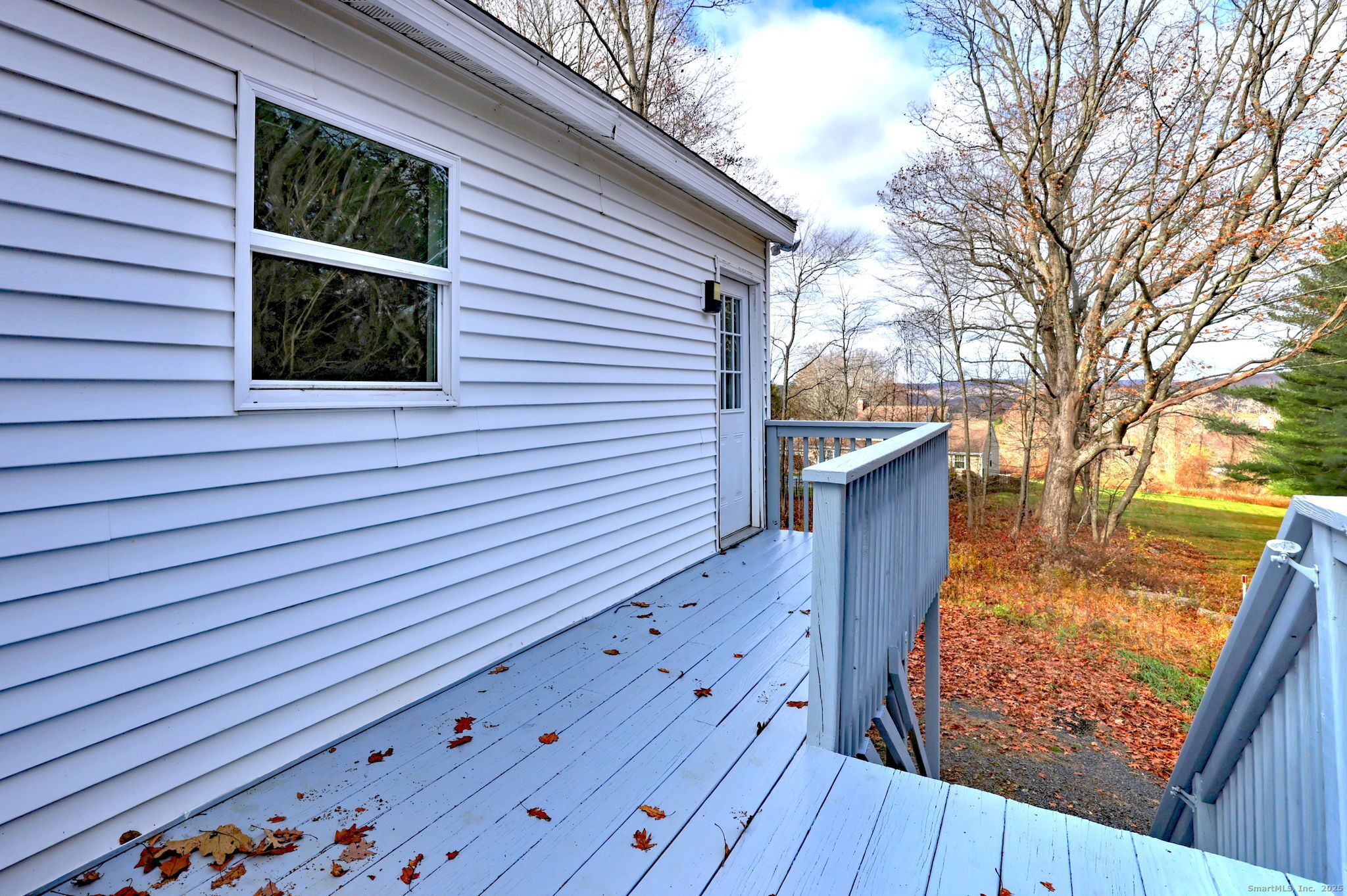 24 Hickory Lane Roxbury, CT 06783 - Photo 35 of 40 a view of a balcony with wooden floor