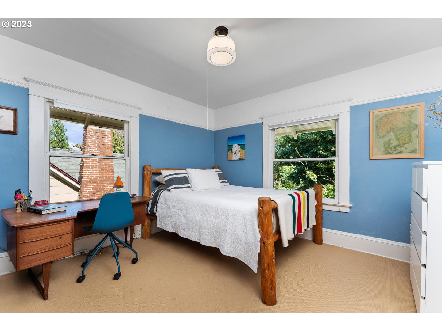 4027 North Colonial Avenue Portland, OR 97227 - Photo 21 of 47 a bedroom with a bed chair and window