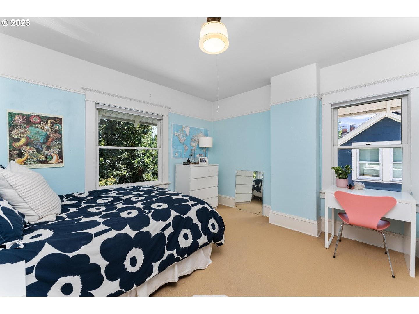 4027 North Colonial Avenue Portland, OR 97227 - Photo 22 of 47 a bedroom with a bed and wooden floor
