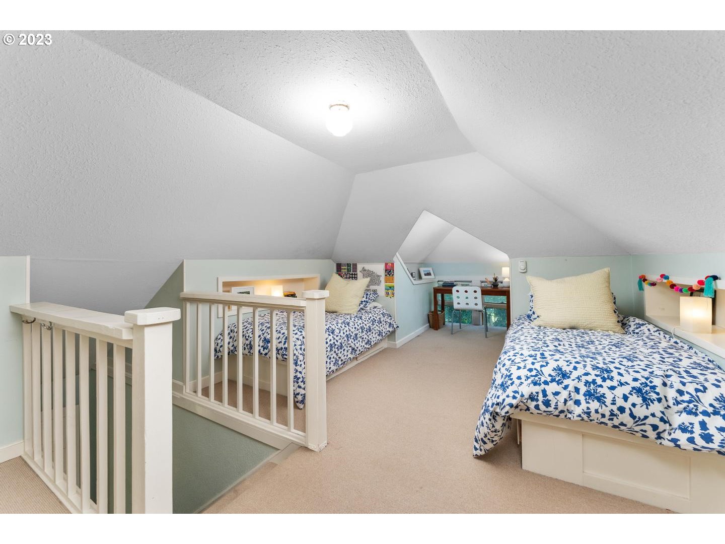 4027 North Colonial Avenue Portland, OR 97227 - Photo 23 of 47 a bedroom with a bed next to a large window