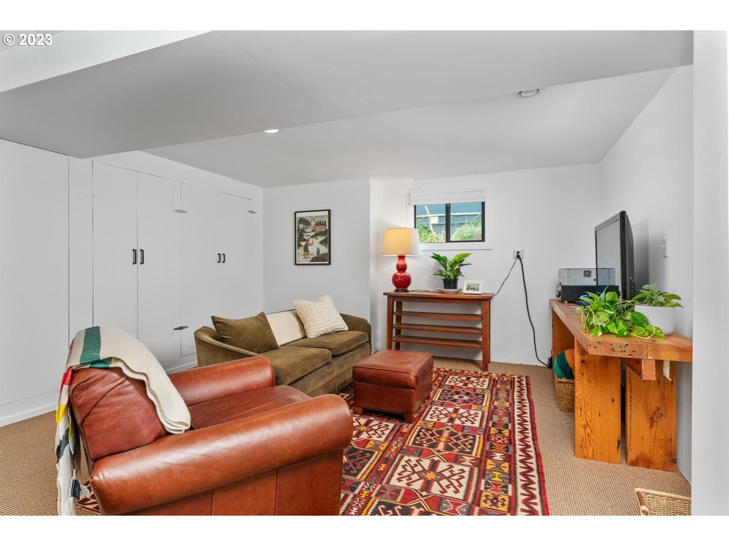 4027 North Colonial Avenue Portland, OR 97227 - Photo 26 of 47 a living room with furniture and a rug