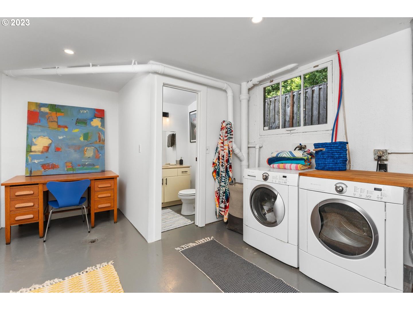 4027 North Colonial Avenue Portland, OR 97227 - Photo 28 of 47 a storage room with washer and dryer