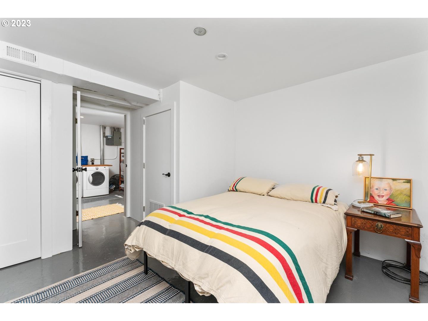 4027 North Colonial Avenue Portland, OR 97227 - Photo 29 of 47 a bedroom with a bed and a desk
