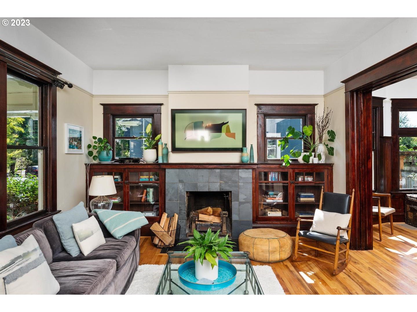 4027 North Colonial Avenue Portland, OR 97227 - Photo 3 of 47 a living room with furniture and a fireplace