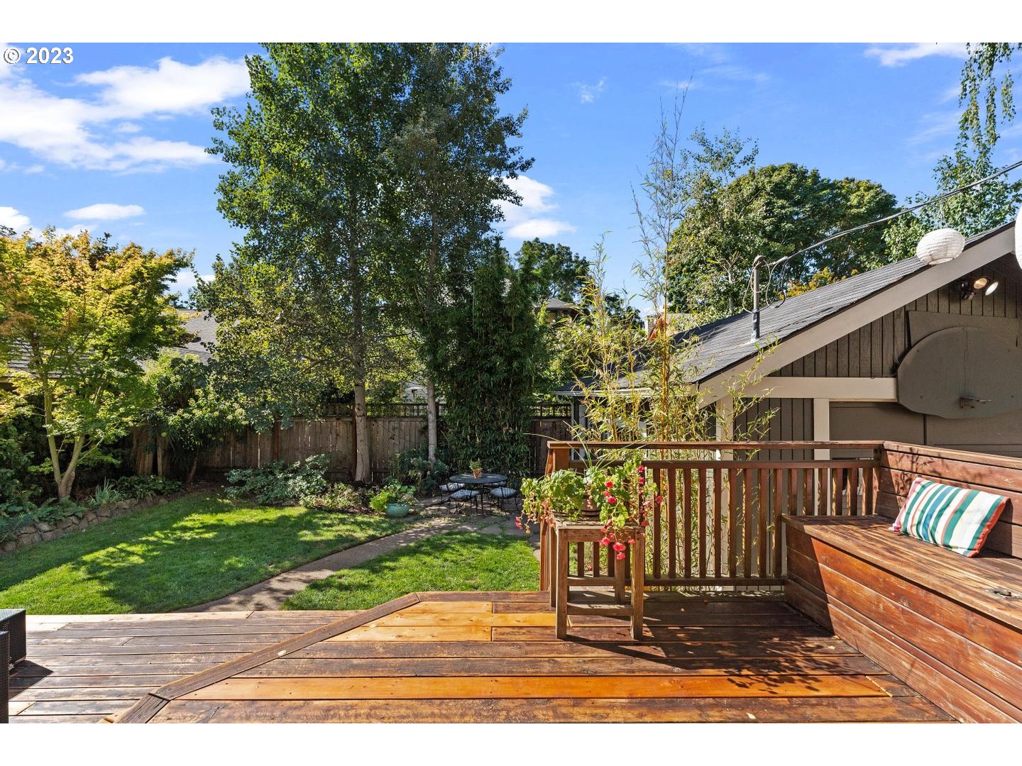 4027 North Colonial Avenue Portland, OR 97227 - Photo 32 of 47 a view of a wooden deck with a yard