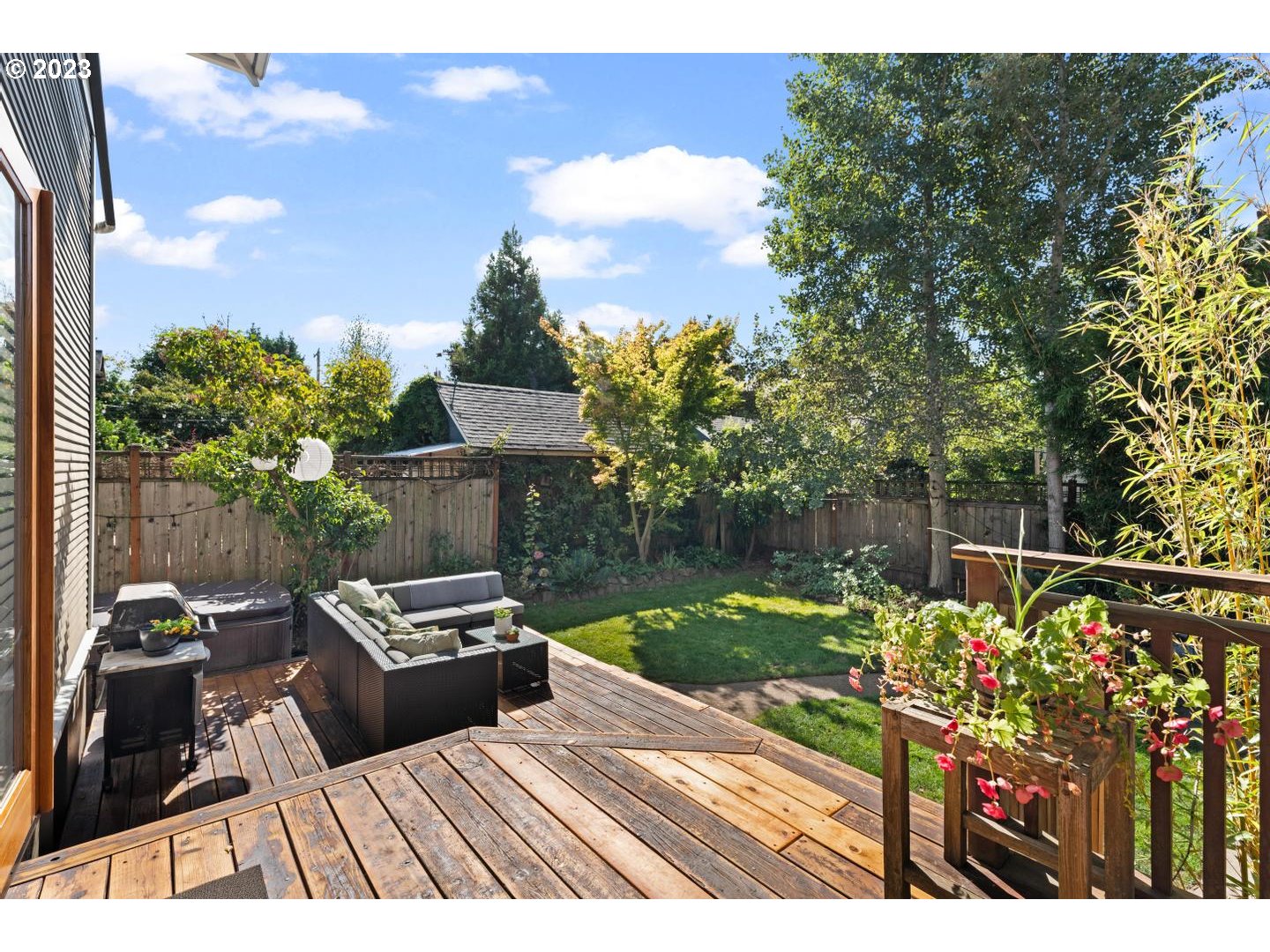 4027 North Colonial Avenue Portland, OR 97227 - Photo 34 of 47 a view of a terrace with furniture and a garden