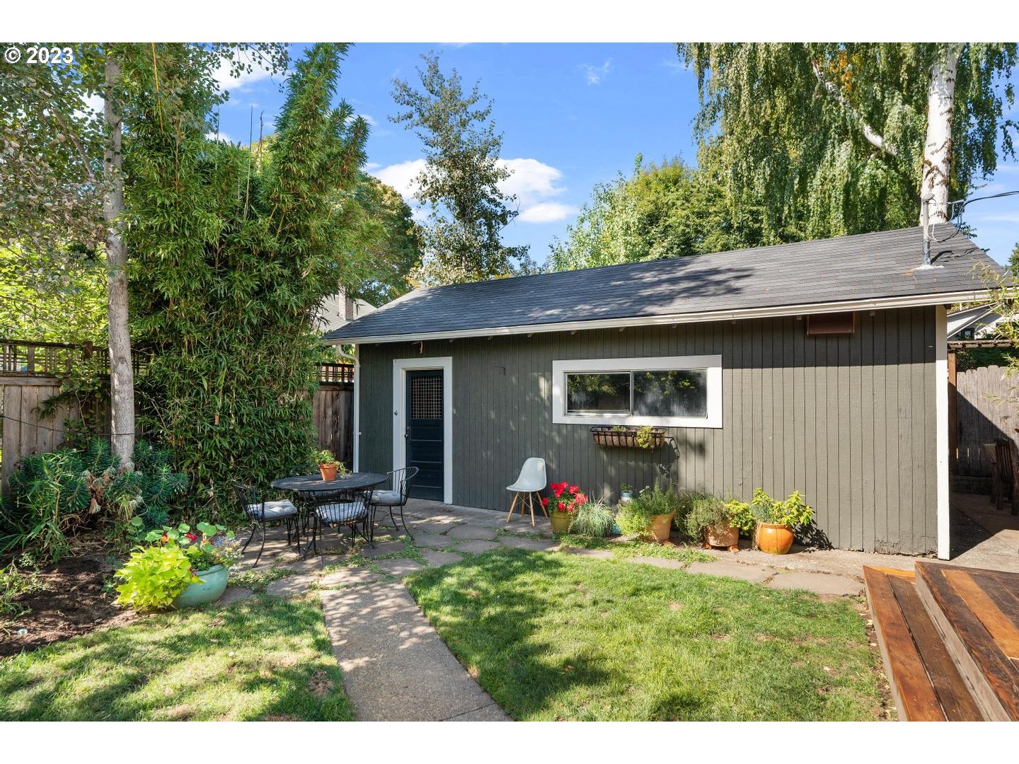 4027 North Colonial Avenue Portland, OR 97227 - Photo 41 of 47 a view of a house with yard and sitting area