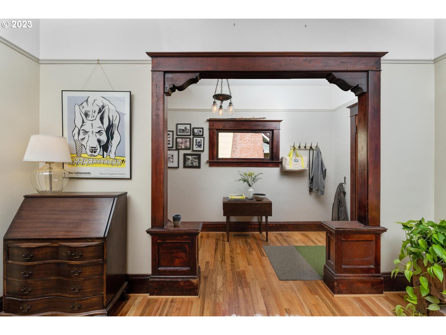 4027 North Colonial Avenue Portland, OR 97227 - Photo 44 of 47 a living room with furniture and a painting on the wall