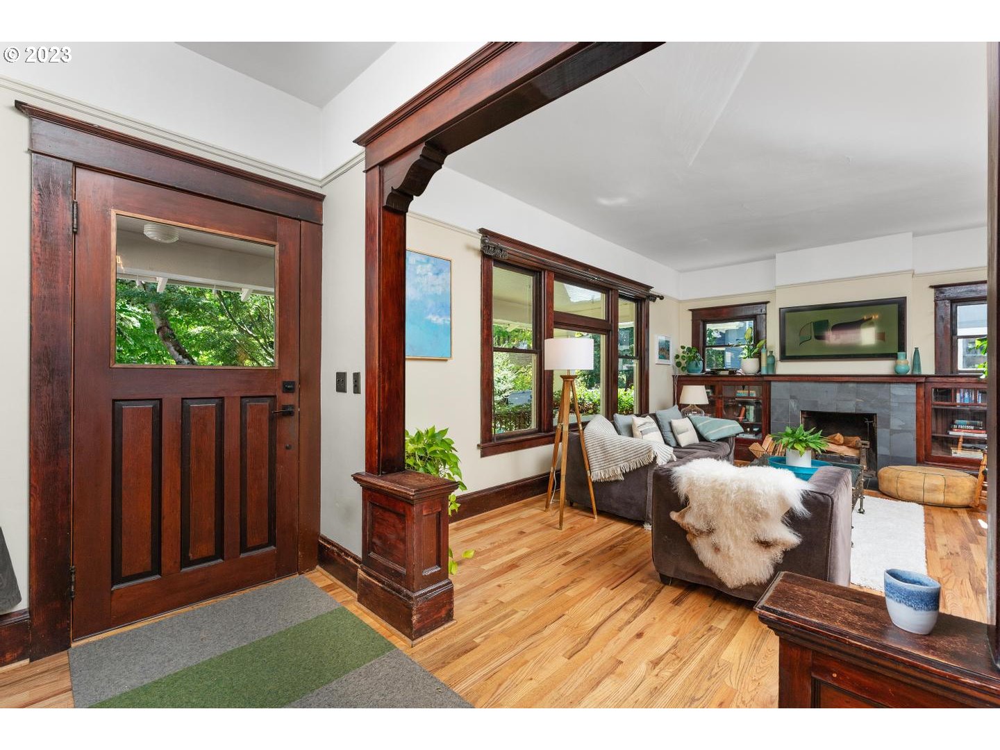 4027 North Colonial Avenue Portland, OR 97227 - Photo 45 of 47 a living room with furniture and a fireplace