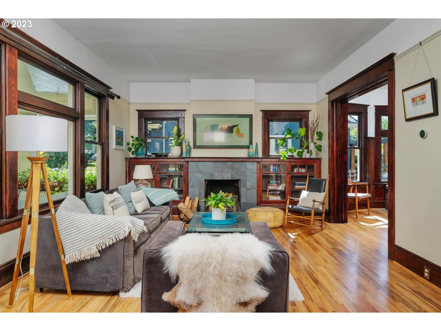 4027 North Colonial Avenue Portland, OR 97227 - Photo 46 of 47 a living room with furniture and a fireplace