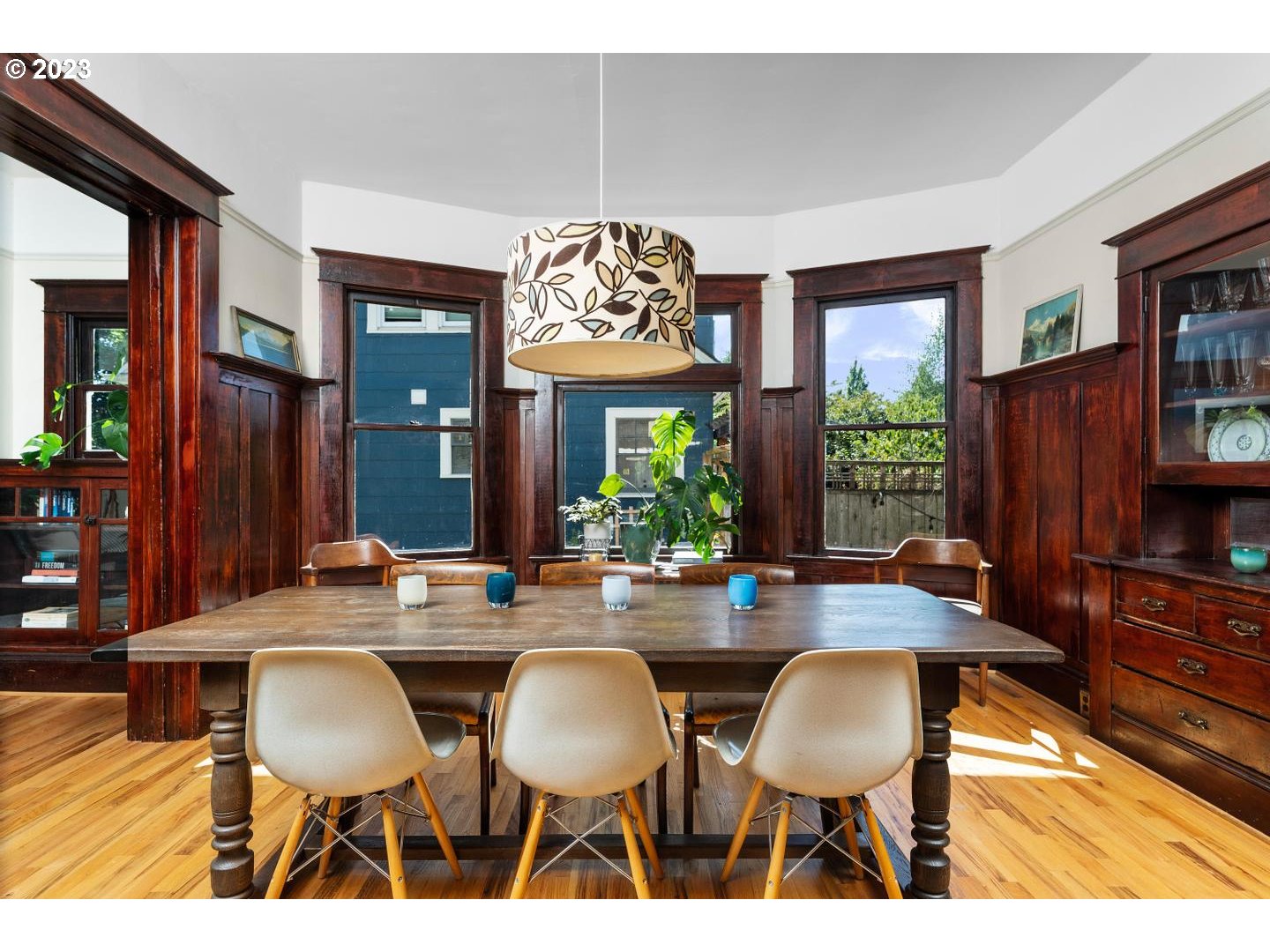 4027 North Colonial Avenue Portland, OR 97227 - Photo 8 of 47 a view of a dining room with furniture window and wooden floor