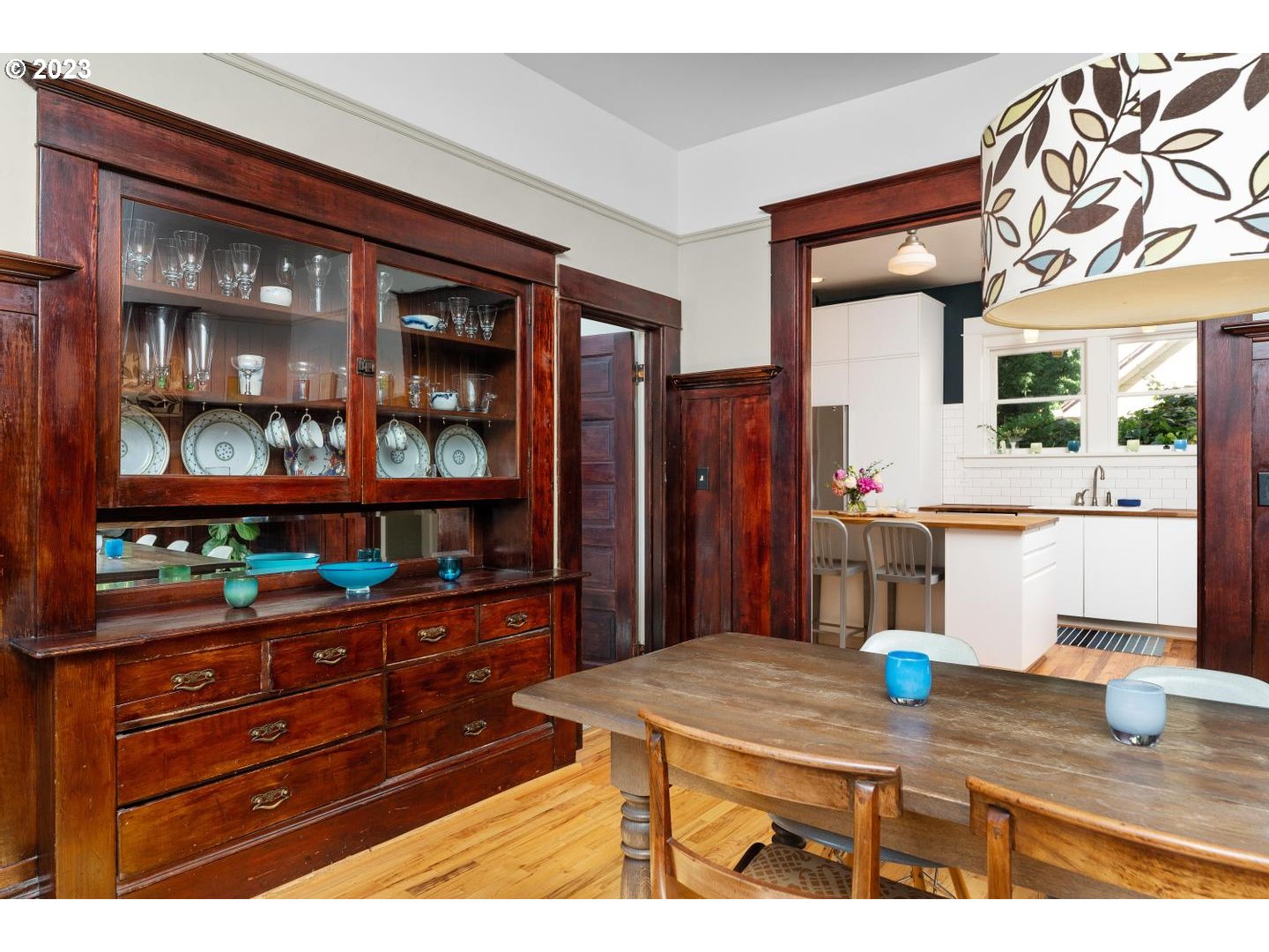 4027 North Colonial Avenue Portland, OR 97227 - Photo 10 of 47 a view of kitchen island with cabinets and wooden floor