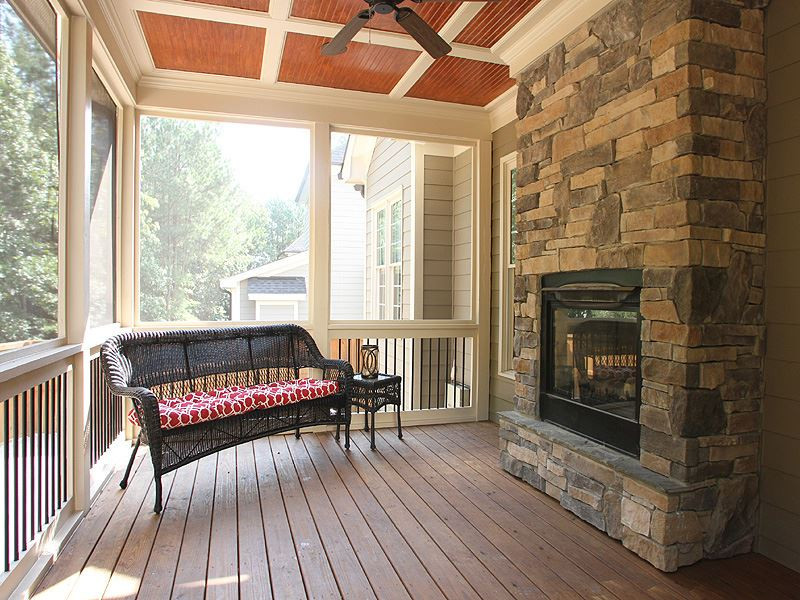 2317 Finley Ridge Lane Raleigh, NC 27615 - Photo 22 of 23 Screened Porch w/ Beautiful Stone Fireplace Overlooks Pool and Patio. Don't miss the Hideaway Sliding Screen Door! Fireplace gives you a warm spot after getting out of the pool on those colder swimming days! Screened Porch