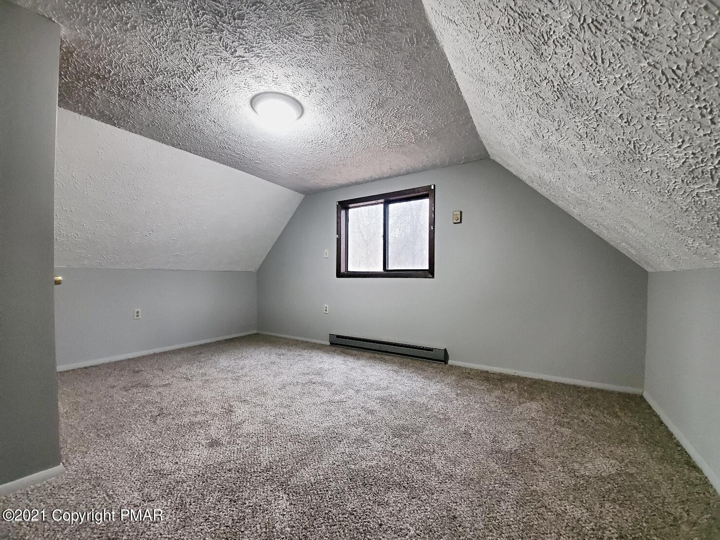 151 Granite Road Long Pond, PA 18334 - Photo 13 of 22 an empty room with a empty space and windows