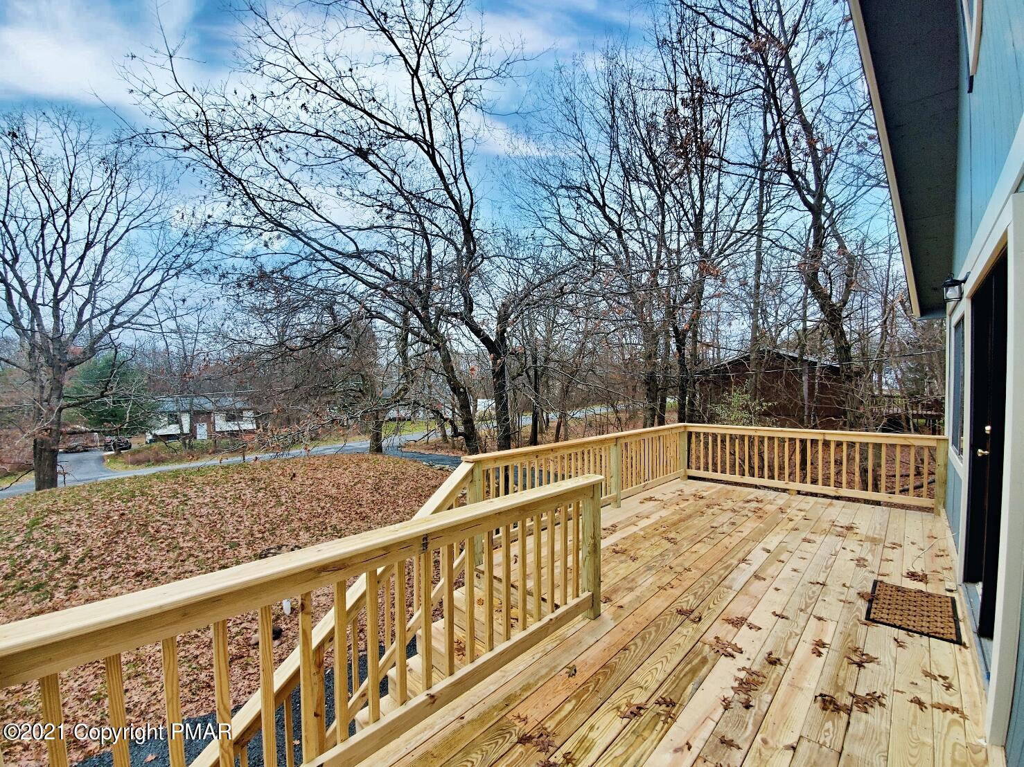151 Granite Road Long Pond, PA 18334 - Photo 5 of 22 a view of balcony with wooden floor and fence