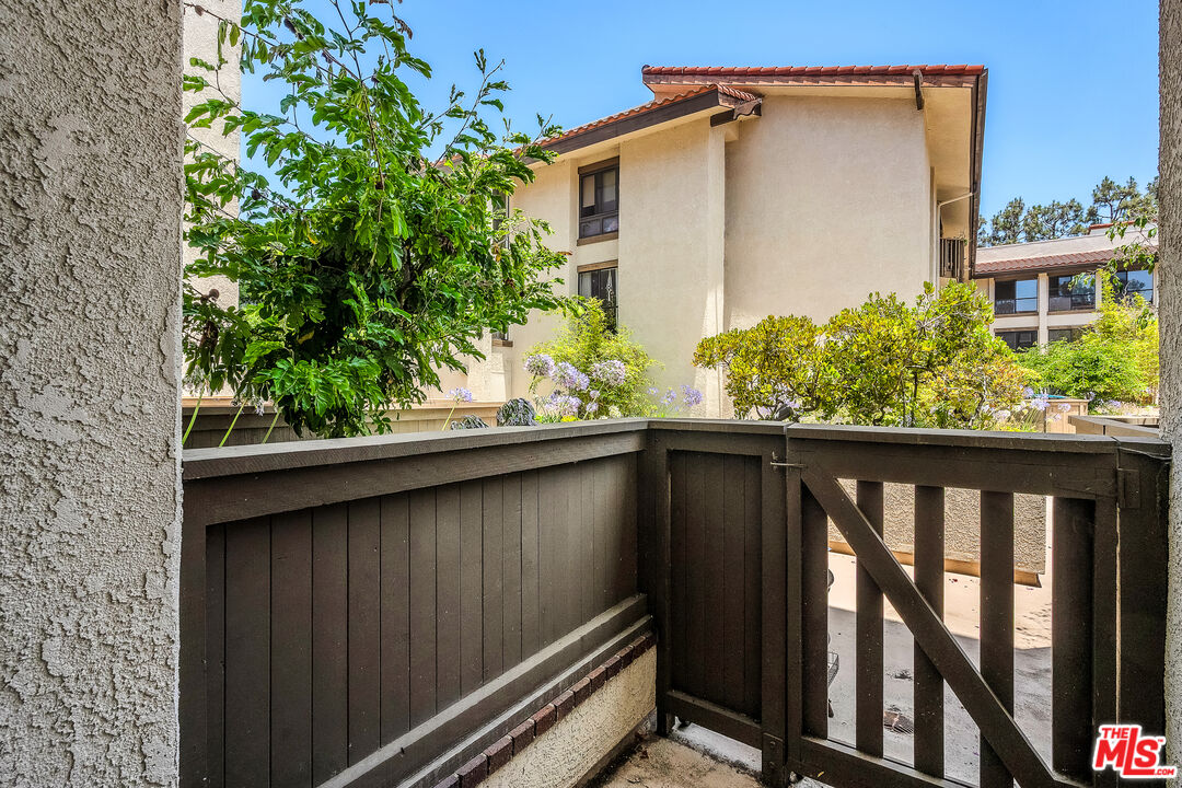 8512 Tuscany Avenue, Unit 207 Playa del Rey, CA 90293 - Photo 24 of 45 a view of balcony with a potted plant