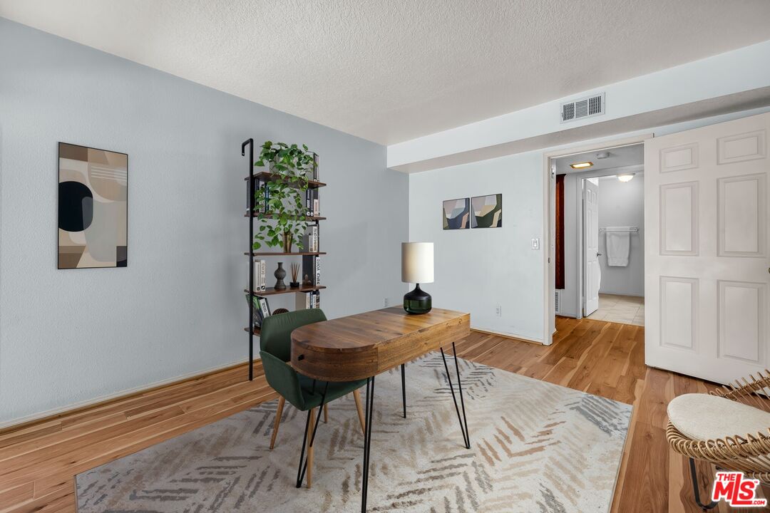 8512 Tuscany Avenue, Unit 207 Playa del Rey, CA 90293 - Photo 34 of 45 a view of a livingroom with furniture