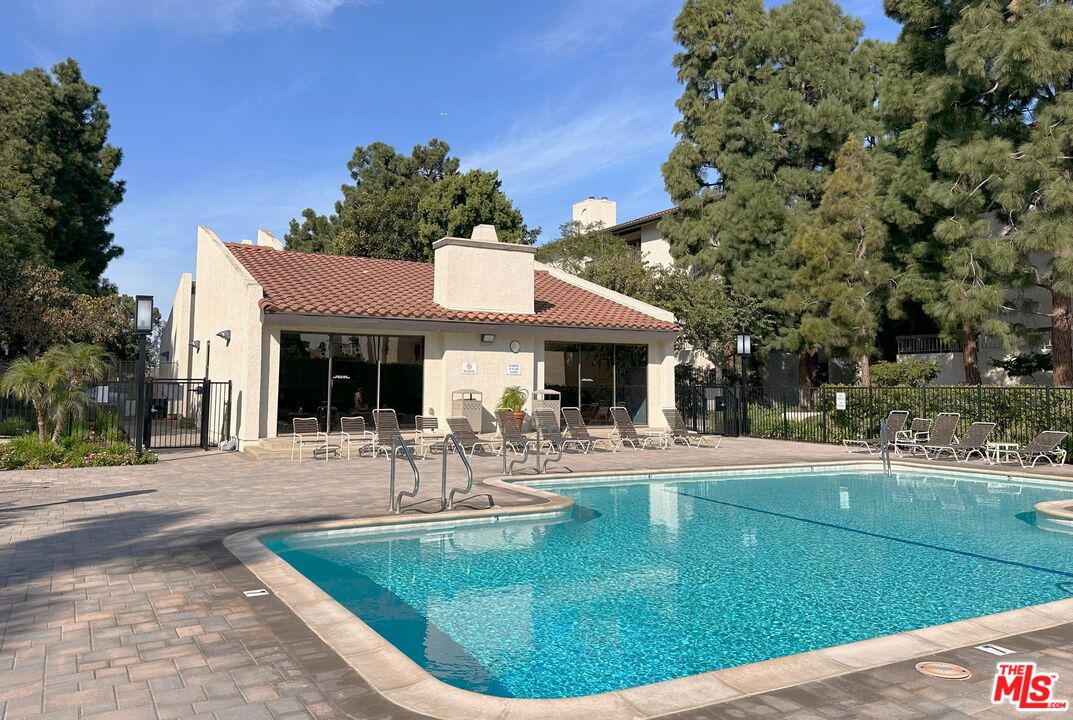 8512 Tuscany Avenue, Unit 207 Playa del Rey, CA 90293 - Photo 39 of 45 a view of a house with pool porch and sitting area