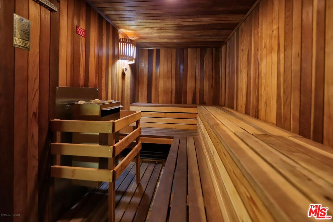 8512 Tuscany Avenue, Unit 207 Playa del Rey, CA 90293 - Photo 42 of 45 a view of a room with wooden floor and windows