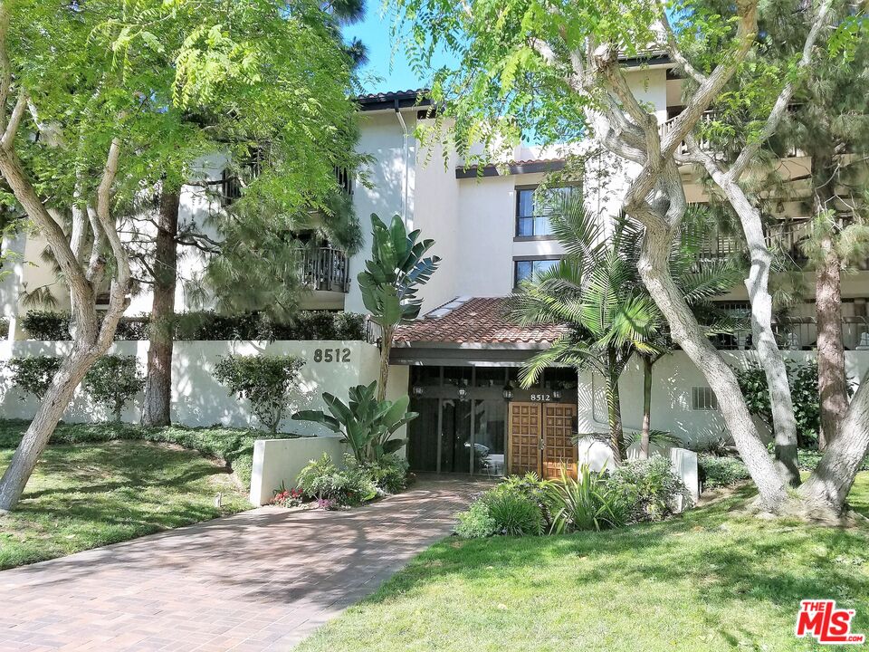 8512 Tuscany Avenue, Unit 207 Playa del Rey, CA 90293 - Photo 45 of 45 front view of a house with a yard