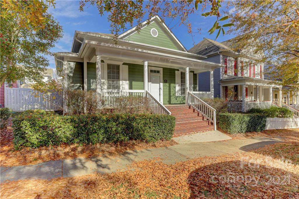 3229 Fifth Baxter Crossing Fort Mill, SC 29708 - Photo 2 of 46 a front view of a house with garden