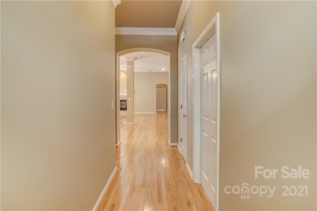 3229 Fifth Baxter Crossing Fort Mill, SC 29708 - Photo 11 of 46 a view of a hallway with wooden floor