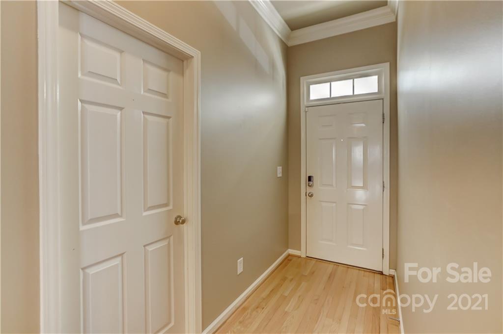 3229 Fifth Baxter Crossing Fort Mill, SC 29708 - Photo 12 of 46 a view of a hallway with wooden floor