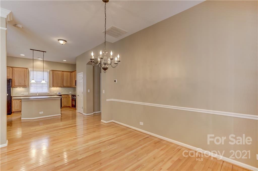 3229 Fifth Baxter Crossing Fort Mill, SC 29708 - Photo 25 of 46 a view of a kitchen with microwave and cabinets
