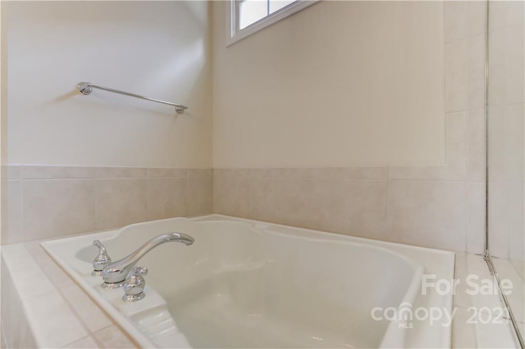 3229 Fifth Baxter Crossing Fort Mill, SC 29708 - Photo 32 of 46 a bathroom with a bathtub