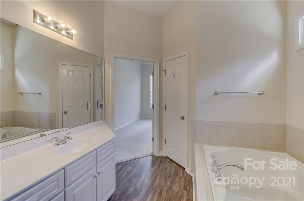 3229 Fifth Baxter Crossing Fort Mill, SC 29708 - Photo 33 of 46 a bathroom with a double vanity sink and mirror